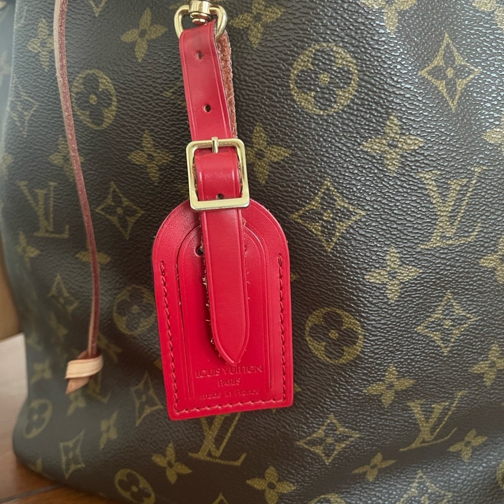 Authentic Louis Vuitton Red Tag